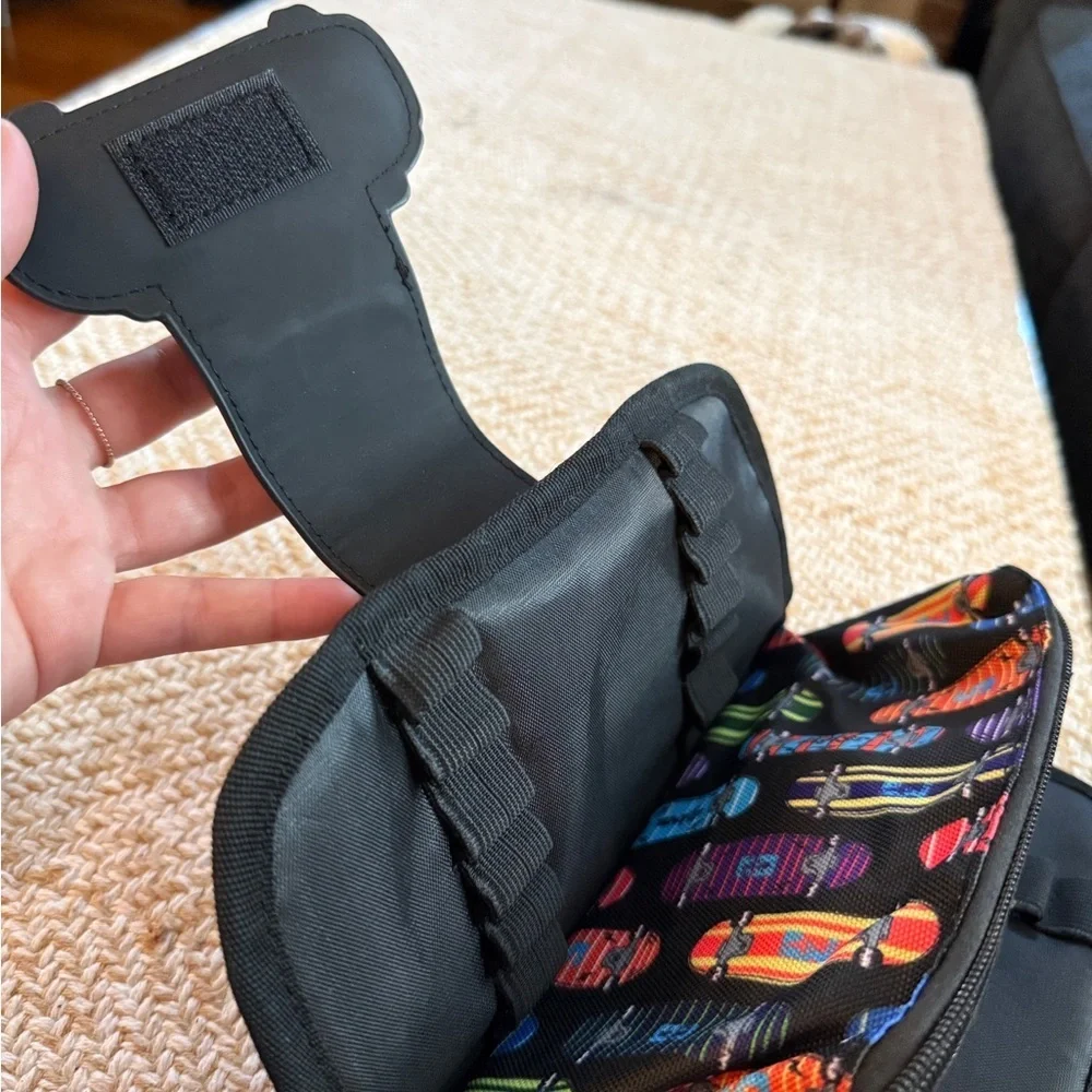 ZIPIT brand fanny pack or hip pouch, featuring a vibrant skateboard pattern